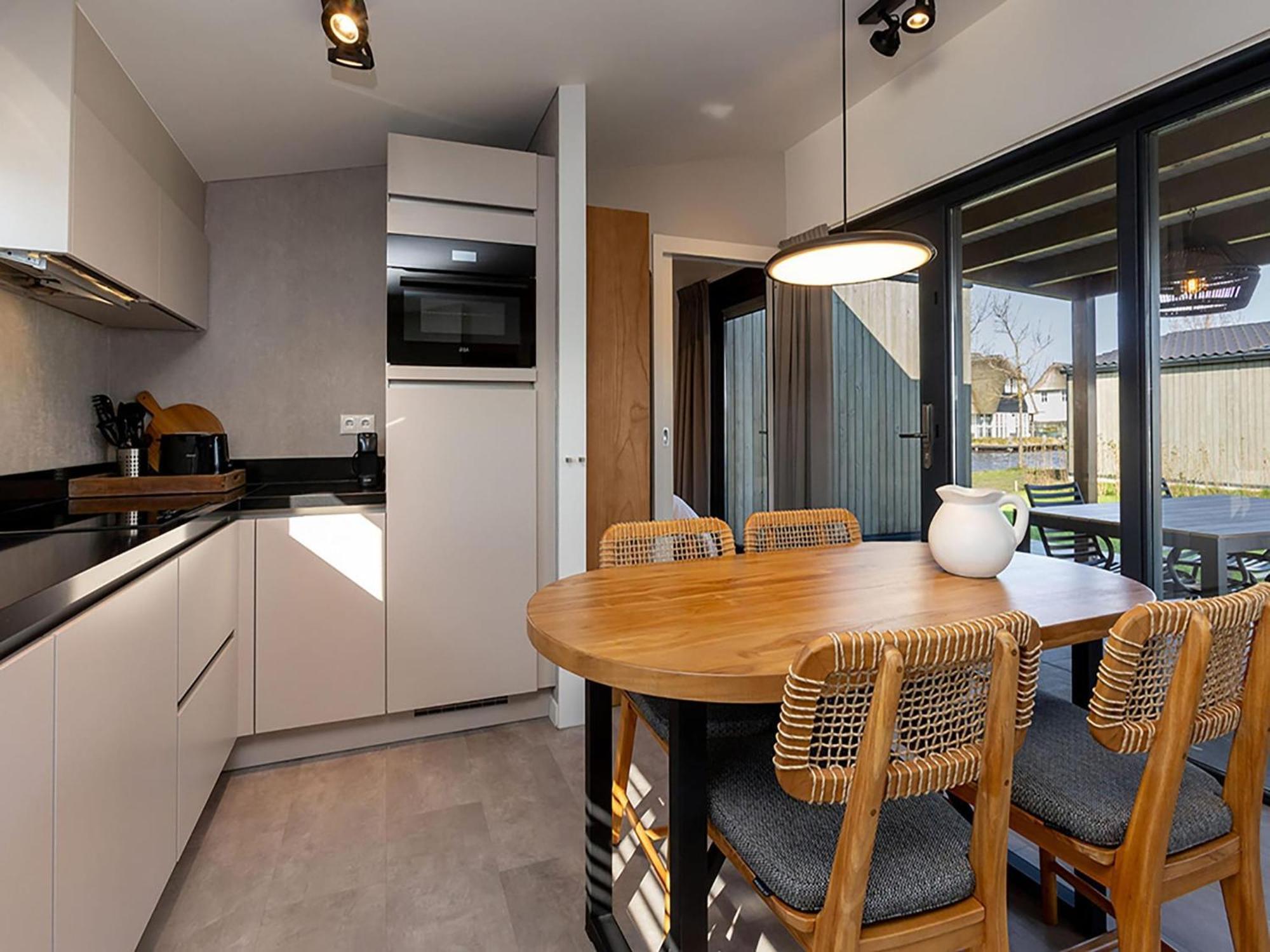 Luxury Docklodge On The Water Delfstrahuizen Bagian luar foto