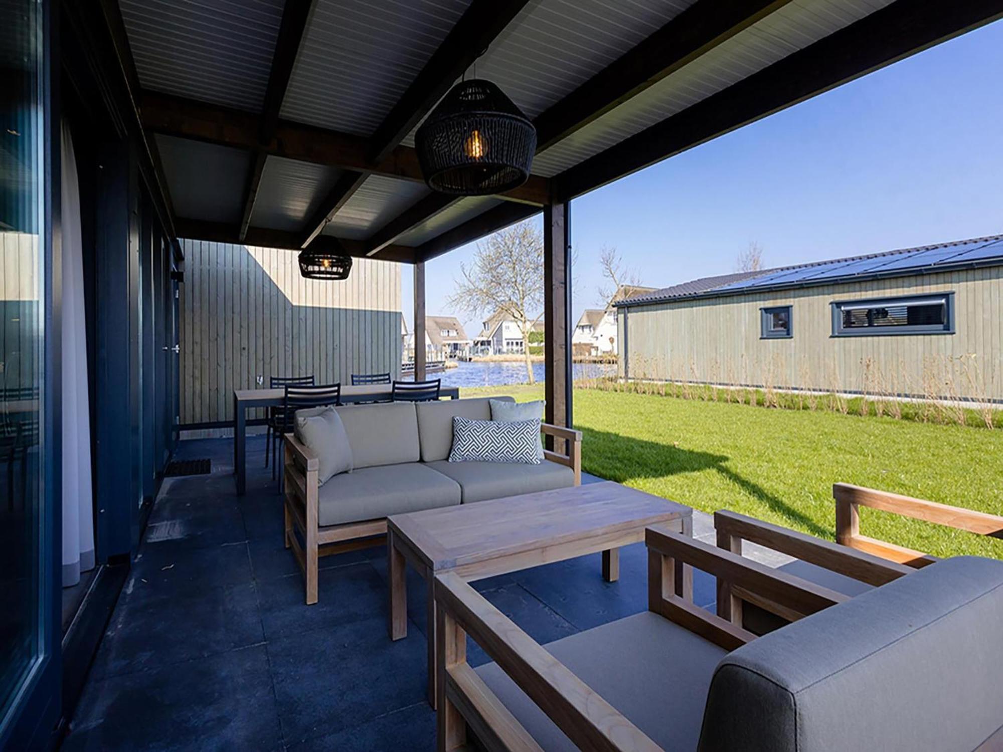 Luxury Docklodge On The Water Delfstrahuizen Bagian luar foto